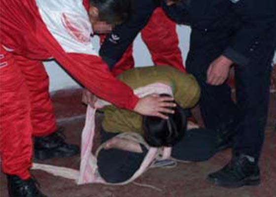 Image for article تمرین‌کنندگان فالون گونگ در زندان سیاهی به نام مرکز آموزش حقوقی گوانگژو، به‌دلیل ایمانشان هدف قرار گرفتند